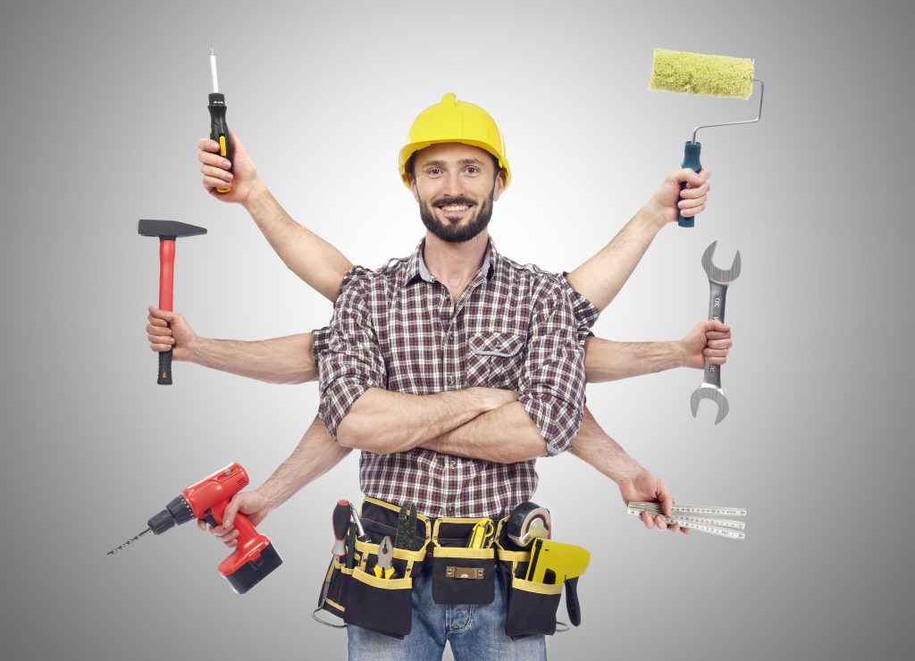 Handyman with tools Kusiak's complete home improvement services are listed