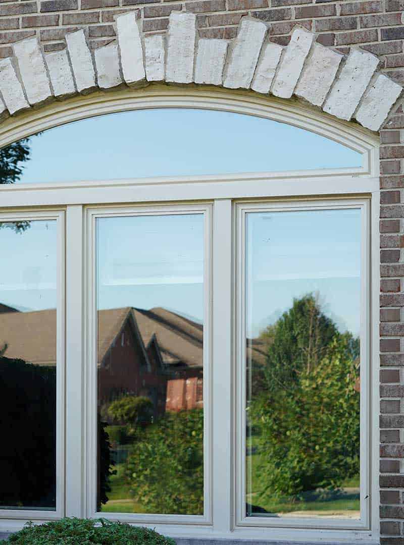 Geometric_and_casement_windows-on-brick-home