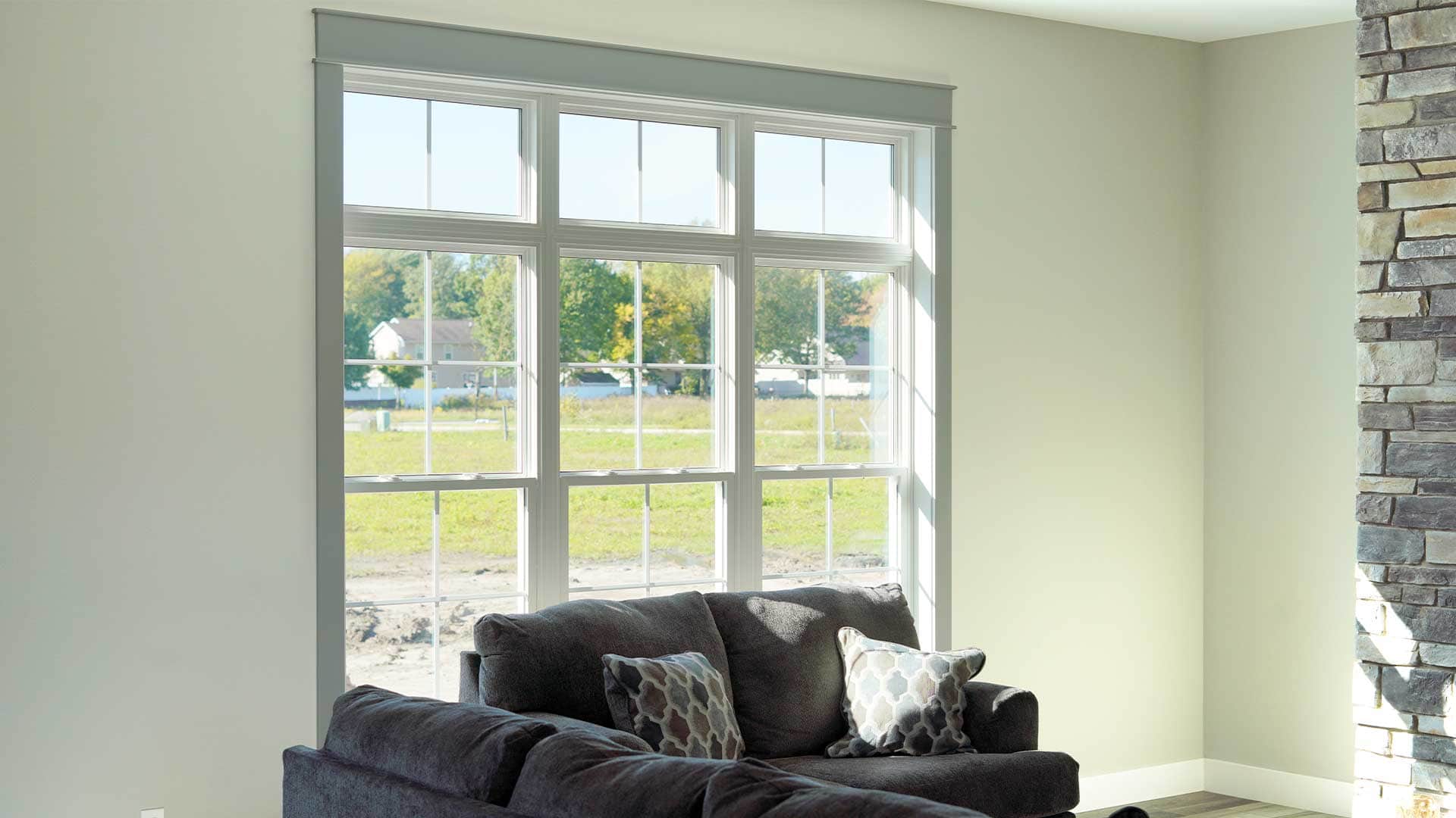 Single_hung_window_livingroom-with-grey-couch